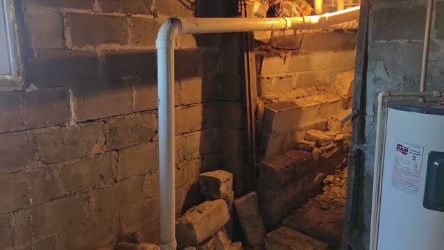 Foundation lift results showing a home returned to level after steel pier installation by JLB Foundation Repair